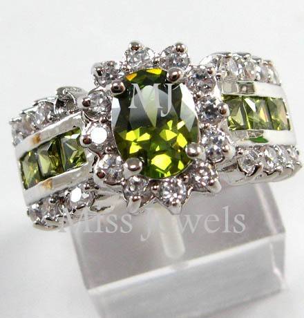 **Magnificent simulated green peridot and diamond dress ring**Size 8